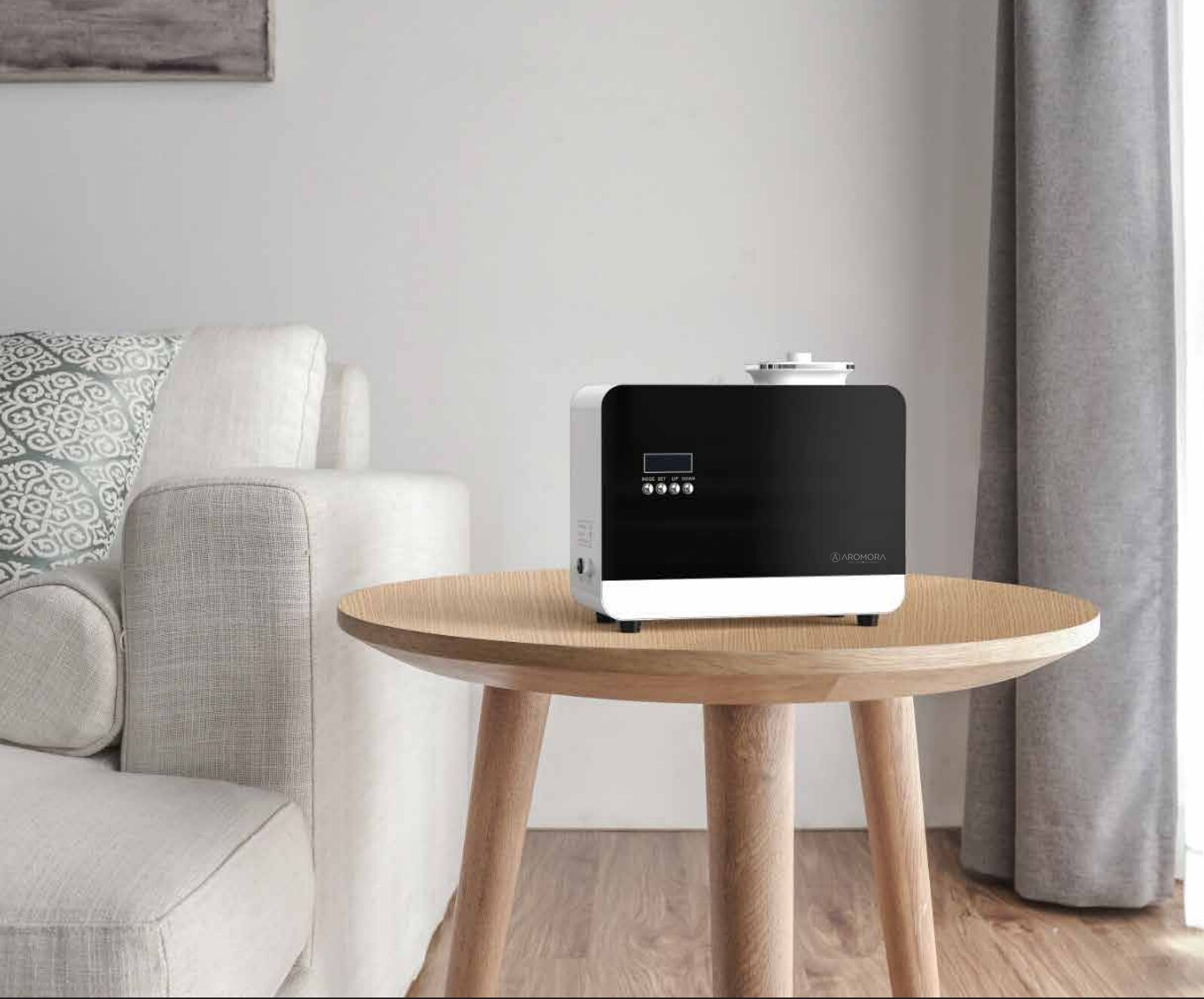 AROMORA ECO Scent diffuser on a wooden side table in a modern living room